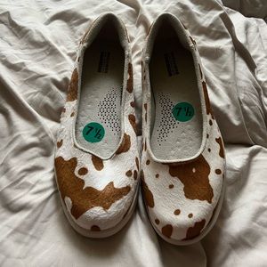 Cow print Skechers